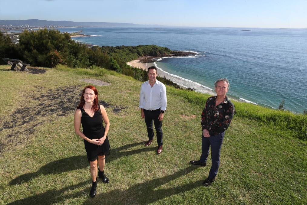 THINK BIG: BlueFloat Energy's Nick Sankey (centre) with Energy Estate's Rosie King and Simon Currie at Hill 60. They were in Wollongong scoping locations for the next step for an offshore wind farm. Picture: ROBERT PEET.