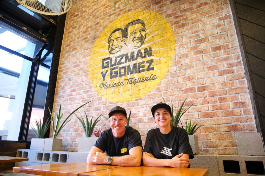 Franchisee Paul O'Neill and Gabi Antelmi at Guzman y Gomez in Wollongong. Picture by Anna Warr.