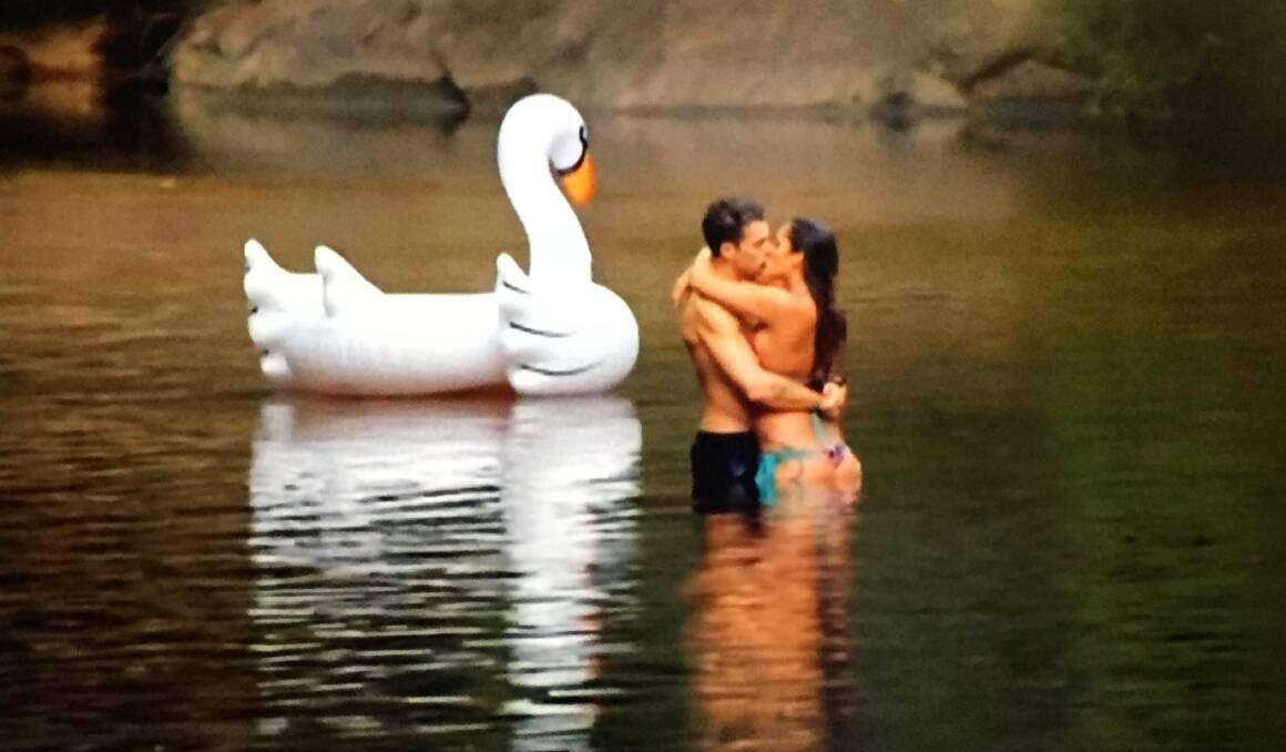 Heating up: Even the inflatable swan had to avert its eyes.