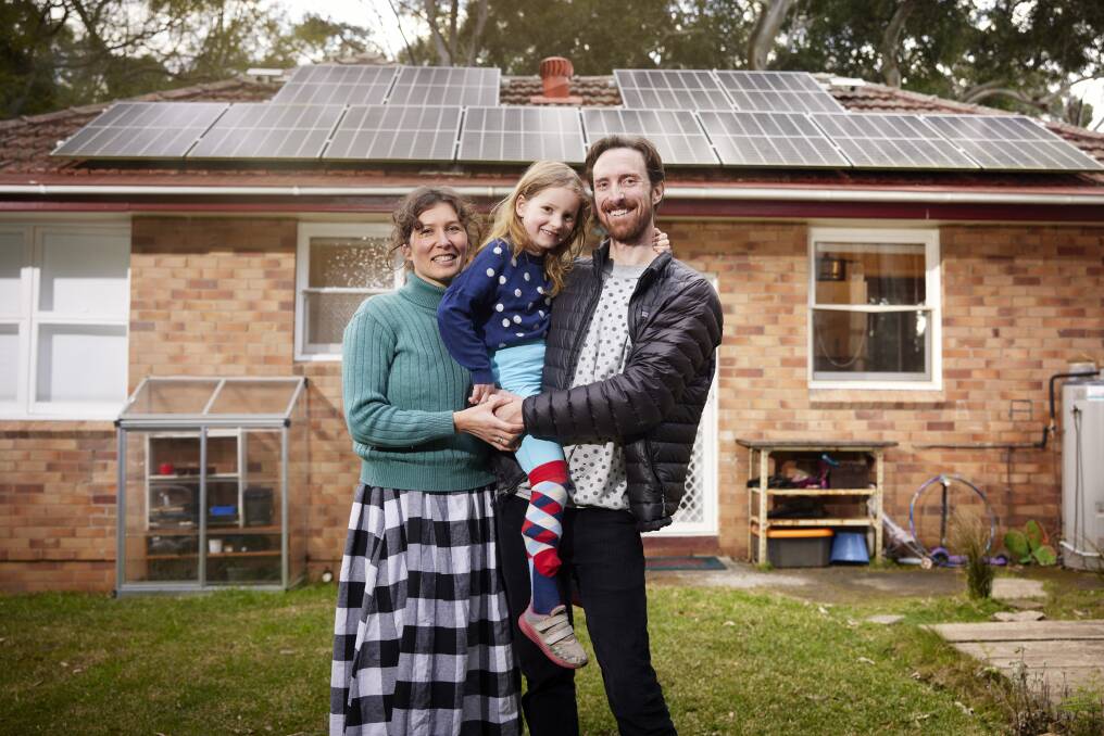 EARLY ADAPTERS: Thirroul's Amy Luschwitz and Trent Jansen, with Ari, 5, are keen on the scheme.