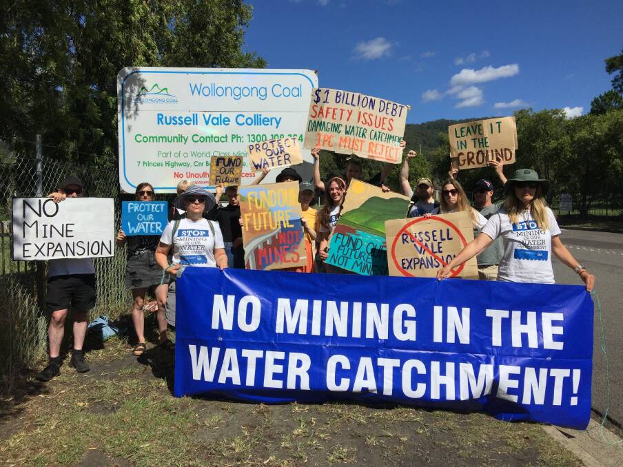 OUTRAGED: Members of the Protect Our Water Alliance outside the Russell Vale mine on Wednesday.