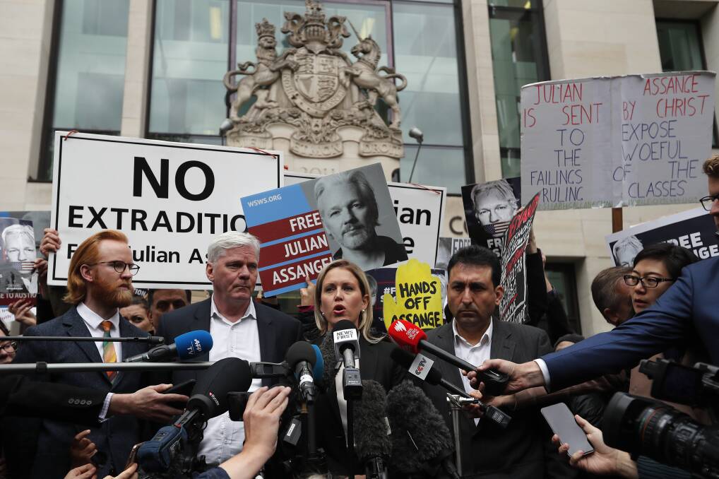 WikiLeaks editor-in-chief Kristinn Hrafnsson and Robinson address the media at Westminster Magistrate Court in May 2019. Picture: AP.