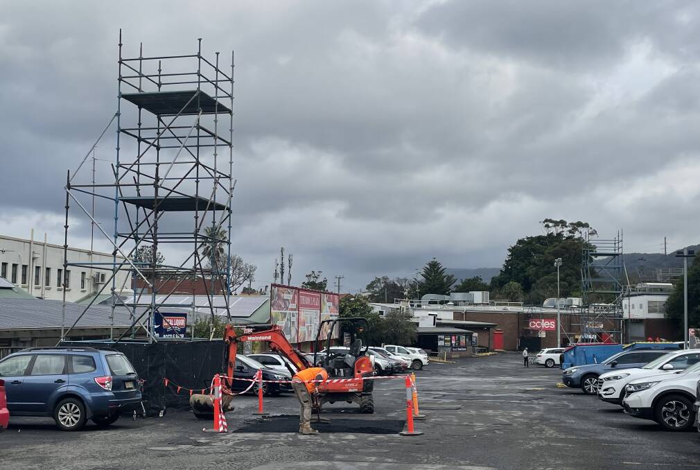 Mainland Civil staff were fixing long-standing potholes in the Thirroul Plaza car park on Wednesday.
