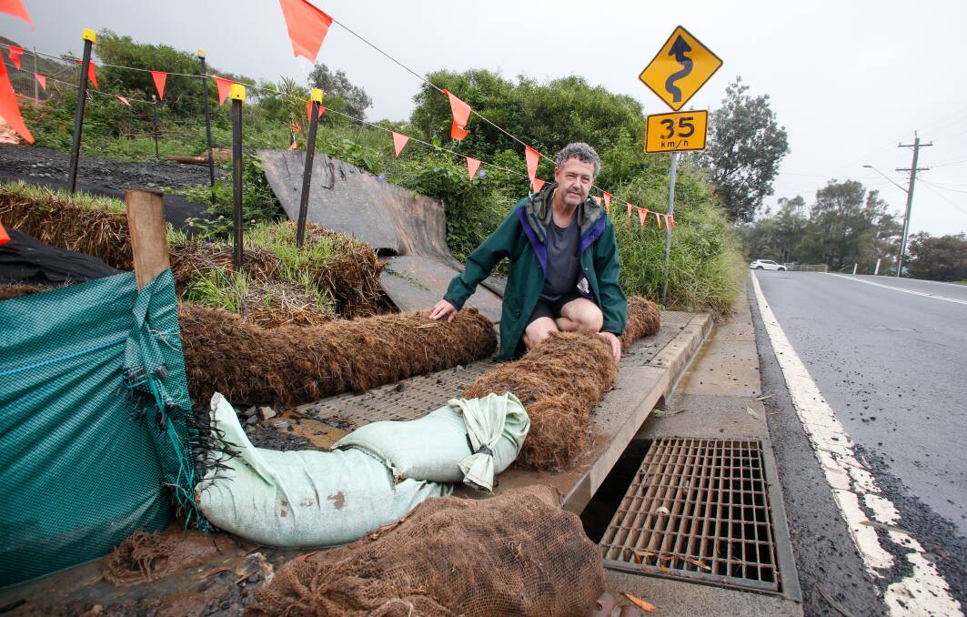 Resident Brian Murphy near some runoff barriers that proved insufficient at Wombarra.