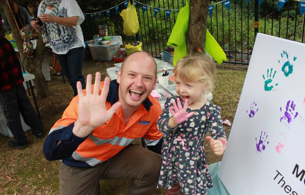 MAKING THEIR MARK: Metropolitan mine commercial manager Rob Hall with his daughter Beatrix at the mine's 130th anniversary family day.