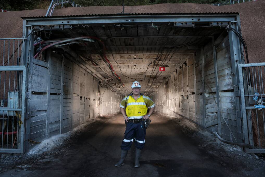 One of the portals to the Russell Vale colliery, with former mine manager David Stone (2014). Picture: ADAM McLEAN.