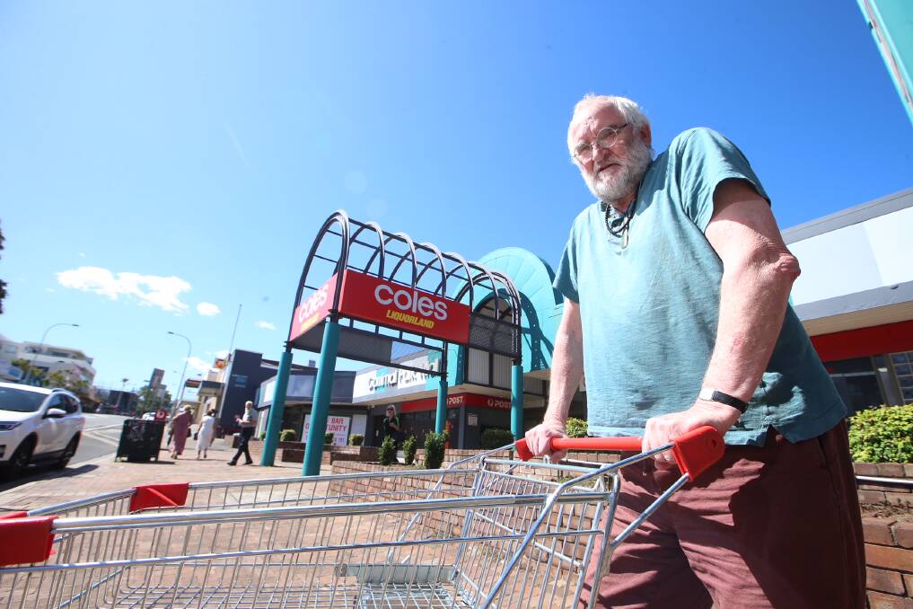 KEEP IT CLEAN: Gavin Workman says he has been trying for more than a week to get wipes to clean Coles trolleys. Picture: Sylvia Liber