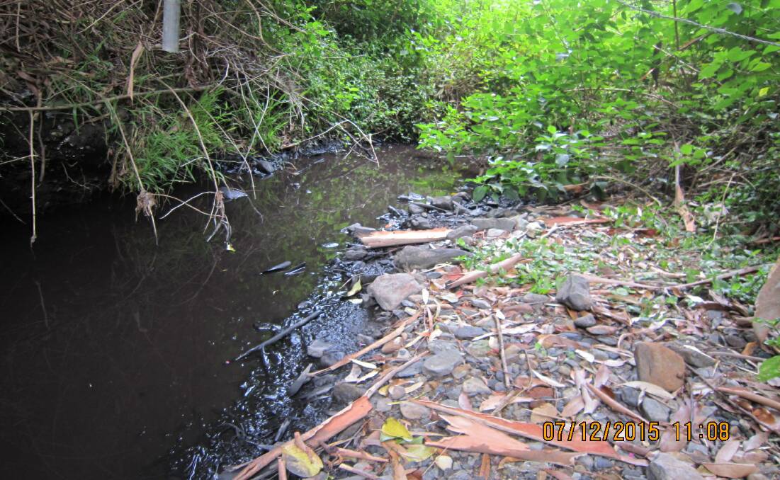 BAD RECORD: Wollongong Coal was fined $30,000 after this incident in December 2015 when coal pollution washed into Bellambi Creek.