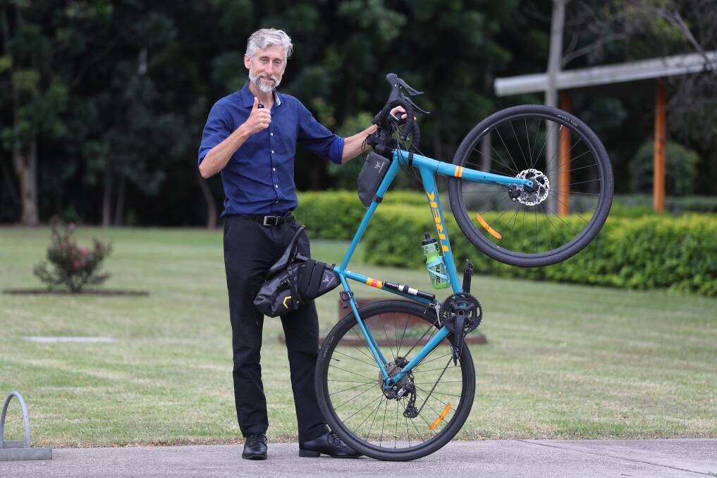 WHEELS UP: Edward Birt rode across Australia this year and likens cars to cigarettes. He'll be speaking at the climate change week online workshop series on Thursday.
