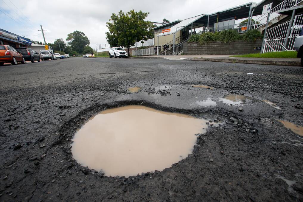 A pothole in Station Street outside North Wollongong railway station. Picture: Anna Warr