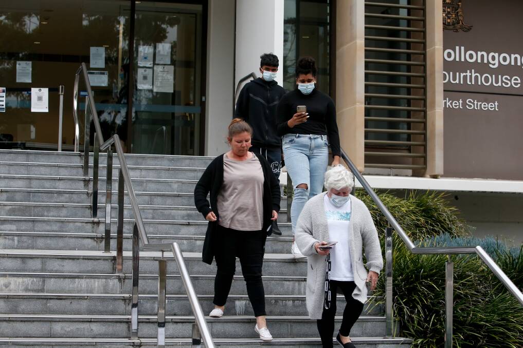 UPSET: Supporters of Andrew Russell and Darren Butler leave the Wollongong courthouse after the verdicts. Picture: Anna Warr