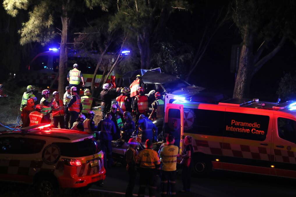 Emergency services at the scene of the crash that killed Ang Darragh and hospitalised her daughter and two grandchildren on Friday evening. Picture: Sylvia Liber
