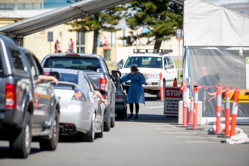 MORE CASES: Illawarra residents queue for COVID testing at Port Kembla. Picture: Anna Warr