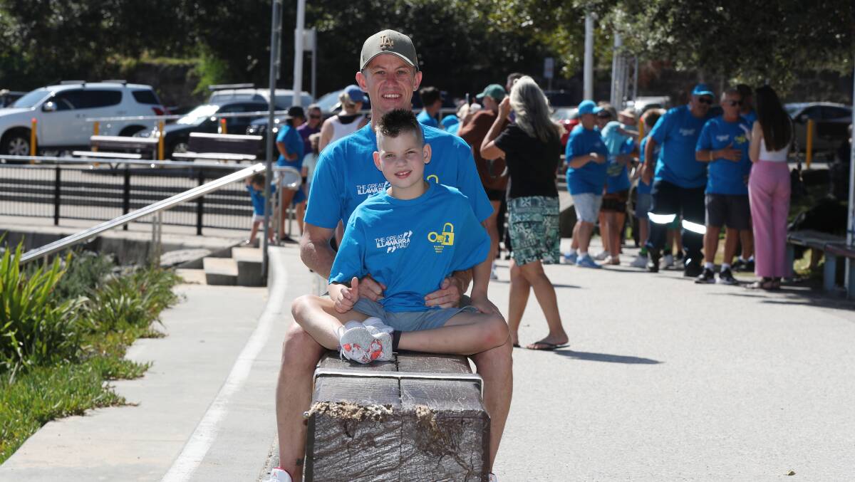 Craig Larkin and son Aidan, 10, who participates in KidsWish programs. Picture by Robert Peet