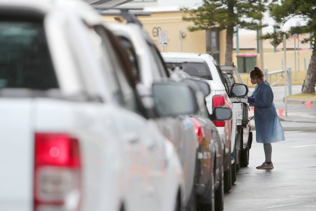 OUTBREAK: Motorists queue up for COVID testing at the Port Kembla drive-through clinic. Picture: Sylvia Liber