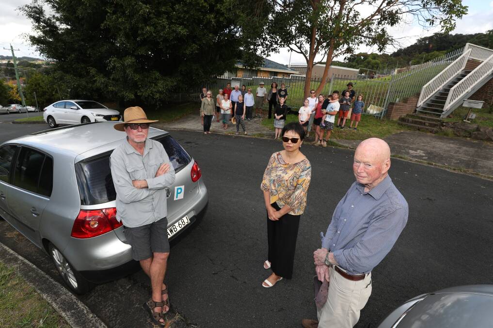 CONCERNED: Felix Bronneberg, Honglin Chen and Geoff Kelly with other residents opposed to the development. Picture: Robert Peet