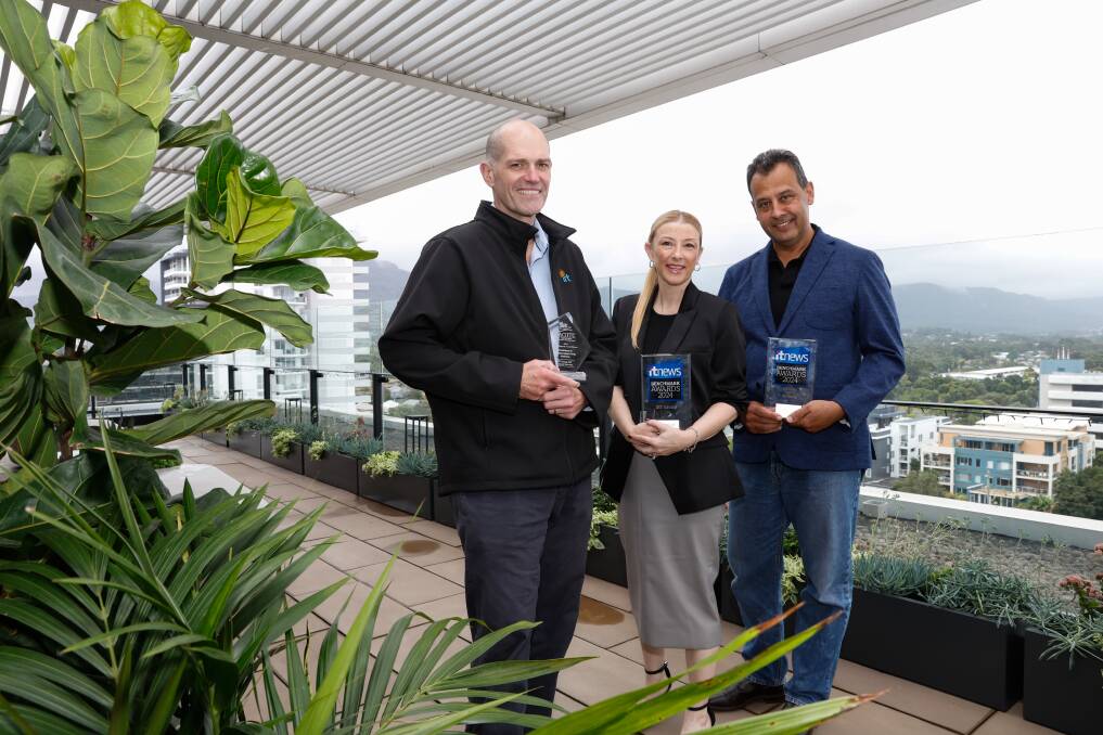 IRT CEO Patrick Reid, home care clinical and quality adviser Raelene Lewis, and executive general manager of IT John Vohradsky with the awards. Picture by Anna Warr