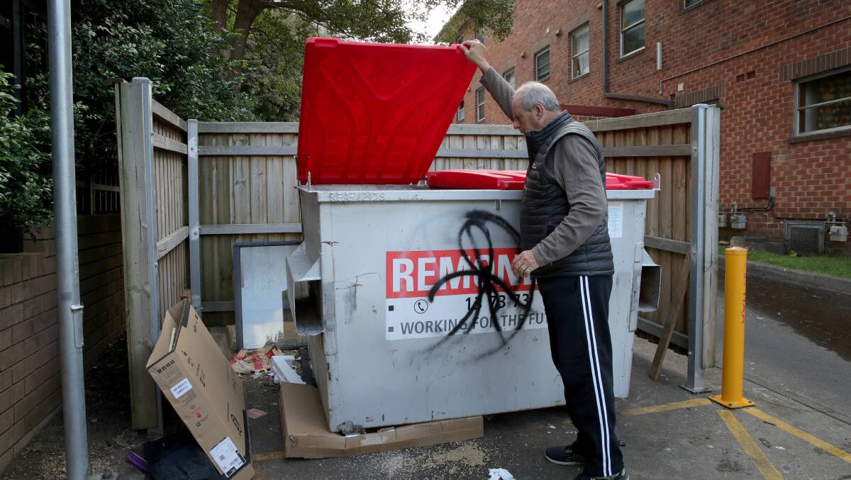Wilson Street resident Les Wilson with the bin that has residents concerned. Picture by Sylvia Liber.