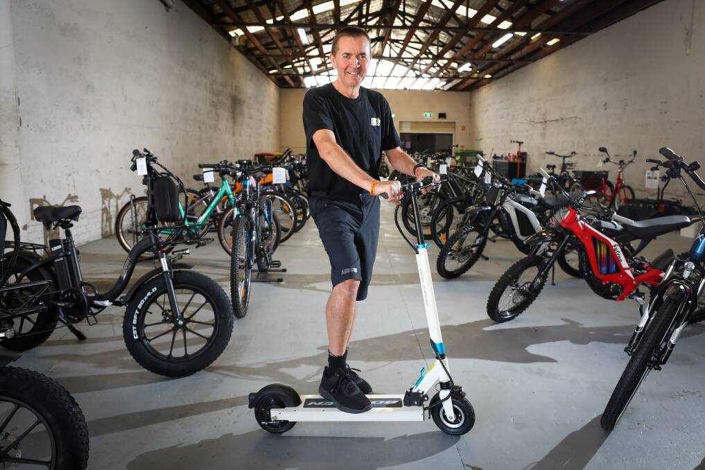 Andrew Larkham, owner of electric bicycle store Riding For Life, is supportive of Wollongong hosting an e-scooter trial. Picture: Adam McLean