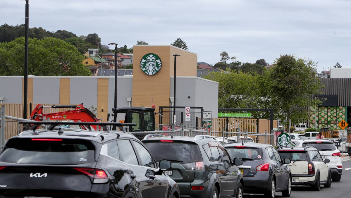 Cars line up to enter the drive-thru at Starbucks in Warrawong on Monday, November 6. Picture by Sylvia Liber