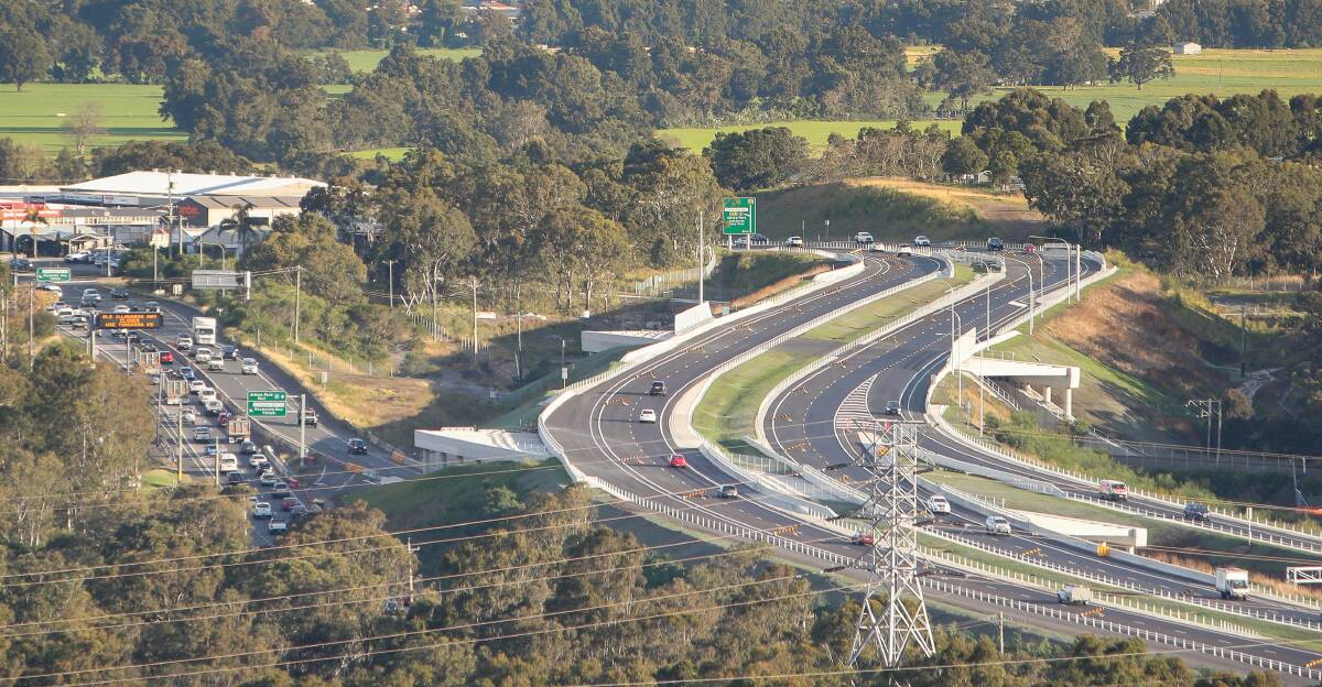 ISSUE: Southbound traffic banks up along the Princes Highway, which sits beside the new section of the M1 motorway. Picture: Adam McLean