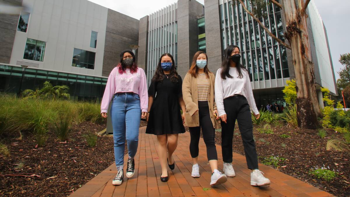 WELCOME BACK: Sazma Samir, Alice Wong, Chelsea Tse and Ami Kesawa are among the first cohort of international students back on campus. Picture: Wesley Lonergan