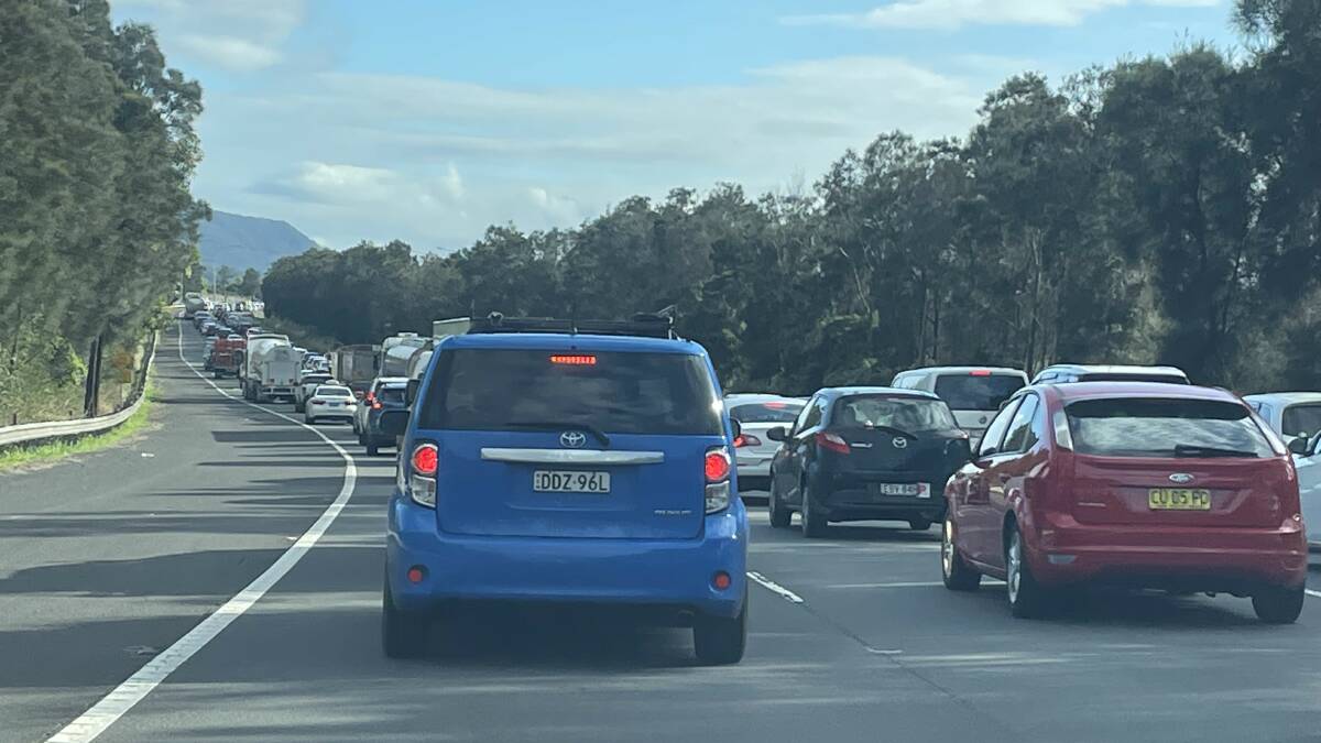 Traffic banked up on the M1 Princes Motorway after a crash at Figtree. Picture by Adam McLean.