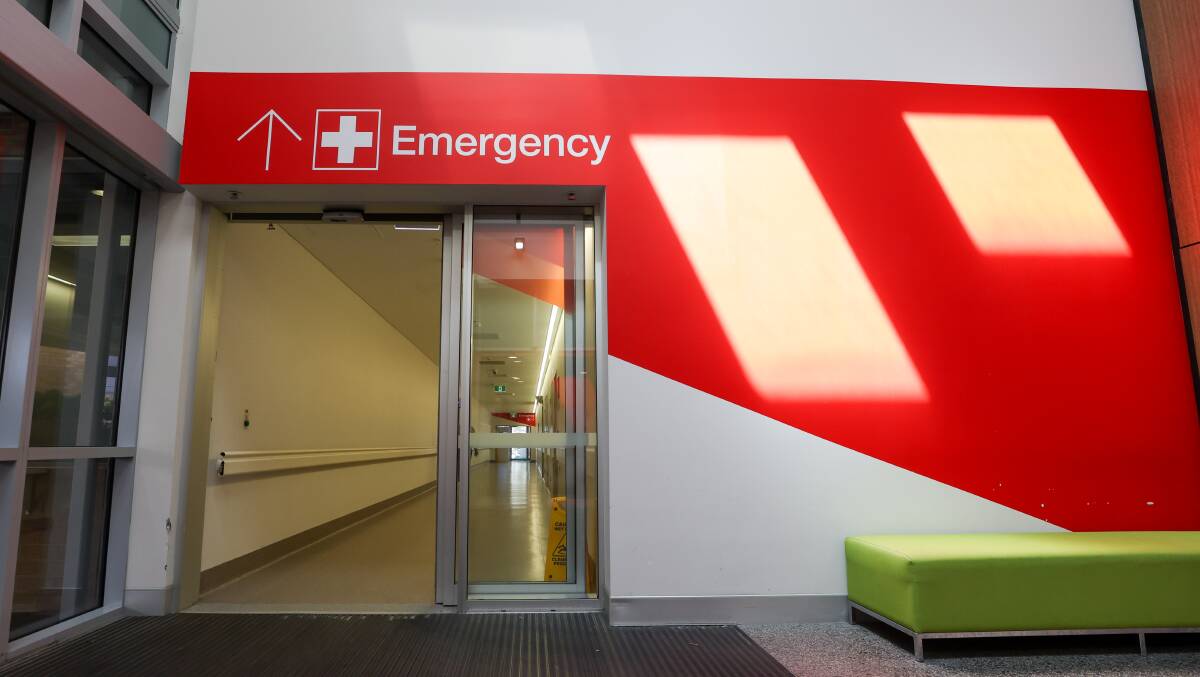 A sign points to the emergency department in Wollongong Hospital. Picture by Adam McLean