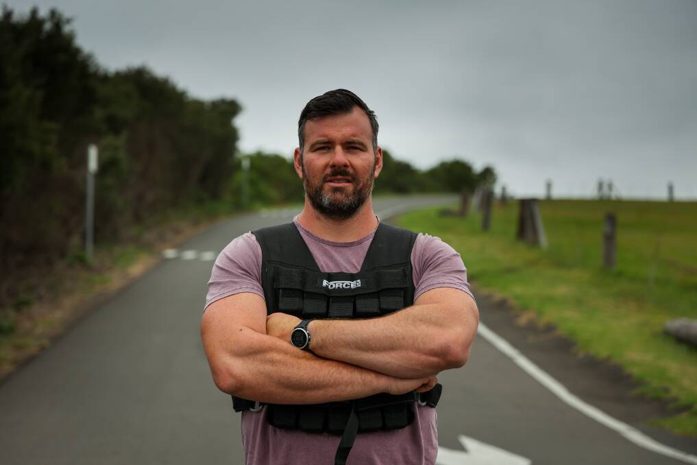 Mick Rigney will climb the hill at the Farm in Killalea Regional Park 216 times in the name of his son Jack, who has muscular dystrophy. Picture by Wesley Lonergan.