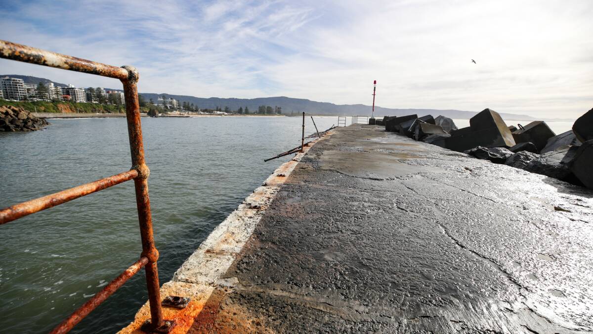 Dilapidated fencing along the Wollongong Harbour southern breakwall. Picture: Adam McLean