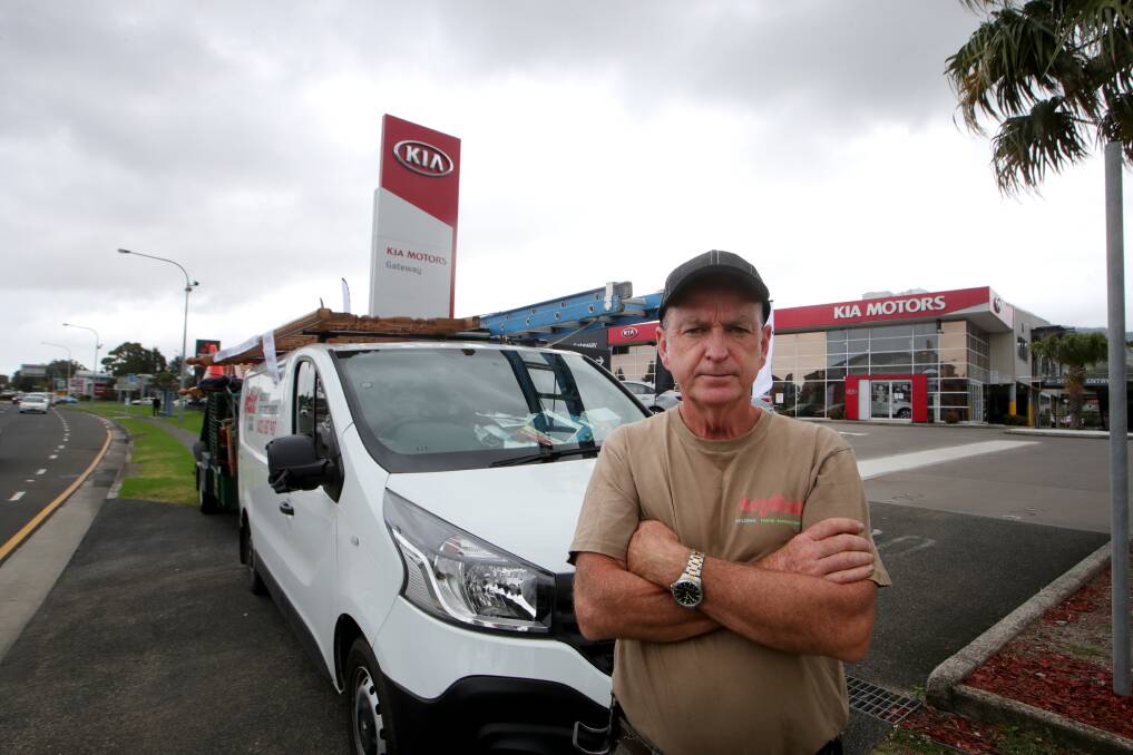 UNHAPPY: Barry Sandry parked across the driveway of a dealership after he was unable to resolve an issue. Picture: Sylvia Liber