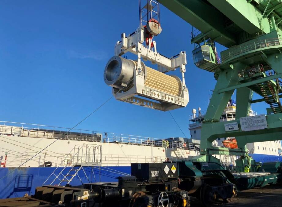 A cask containing reprocessed nuclear waste is loaded onto a ship in the UK before it is brought back to Australia. Picture: Nuclear Transport Solutions