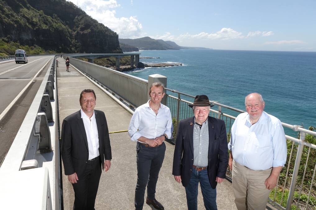Wollongong MP Paul Scully, Active Transport Minister Rob Stokes, Wollongong Lord Mayor Gordon Bradbery and Heathcote MP Lee Evans at Seacliff Bridge, part of the UCI championship course. Picture by Adam McLean.