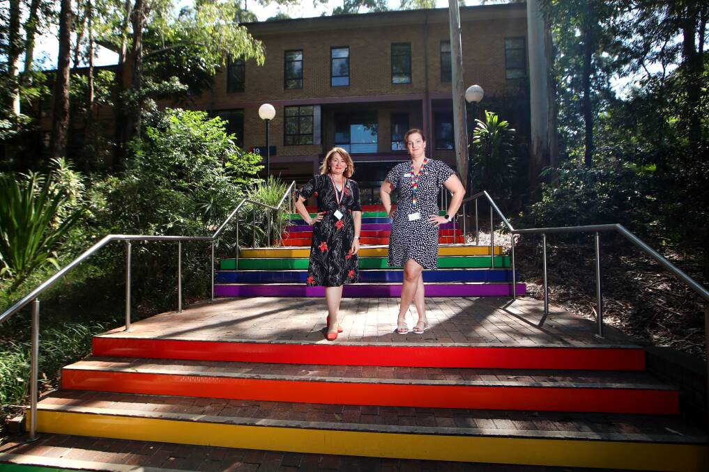 Step forward: Lisa Ucles and Kate Lindenau from UOW were behind the push for the rainbow coloured stairs at the campus. Picture: Sylvia Liber