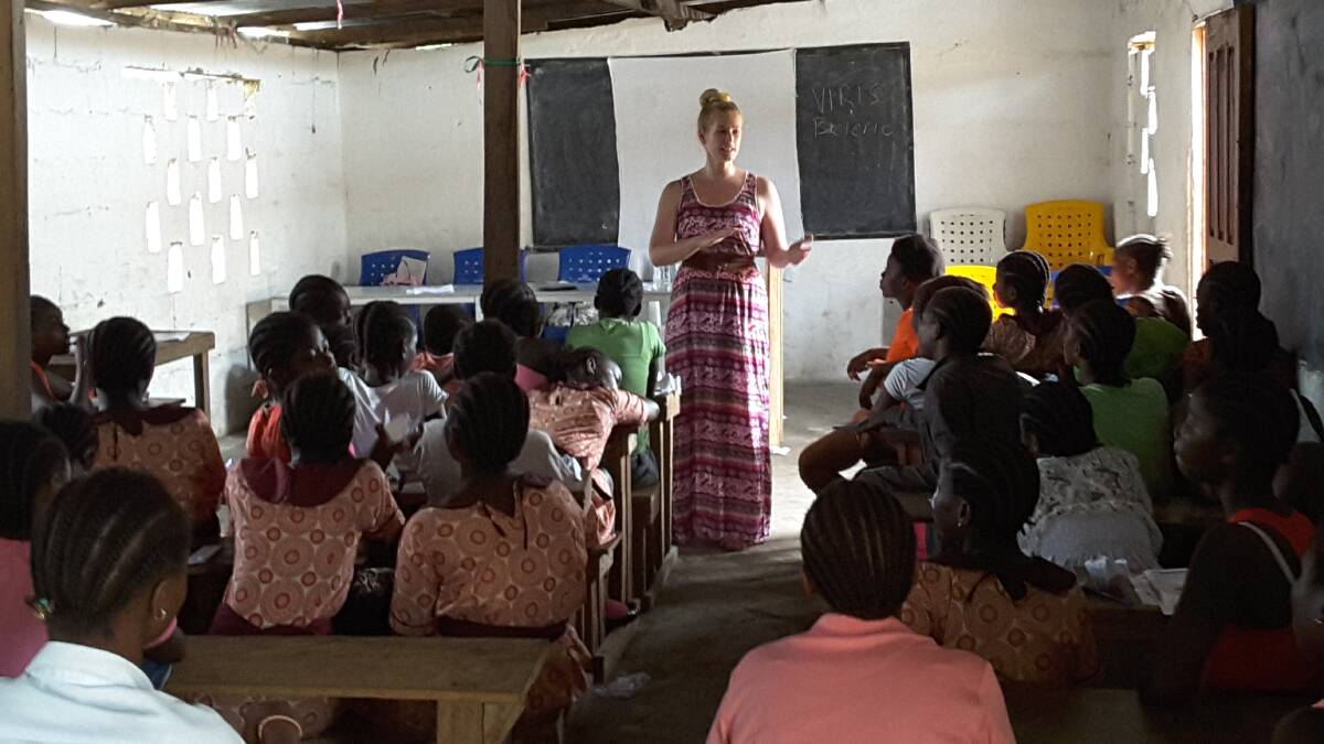 Powerful message: In Monrovia, Wollongong refugee advocate Monique Bolus taught personal development and empowerment strategies to young women.