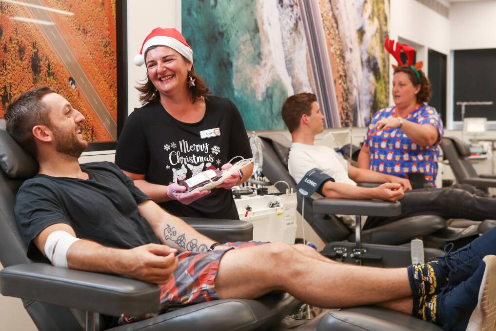 Gift of life: Australian Red Cross Lifeblood nurse Susan Moreno with regular donor Daniel Lannoy (front left) and Donna Campbell with donor Matthew Zylstra at the Wollongong donation centre this week. Picture: Adam McLean