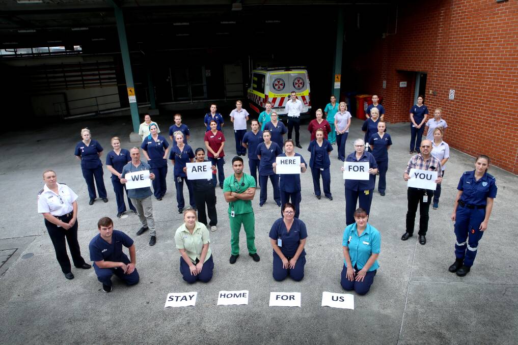 Wollongong Hospital emergency department staff sent a clear message to the community on Monday morning. Picture: Sylvia Liber