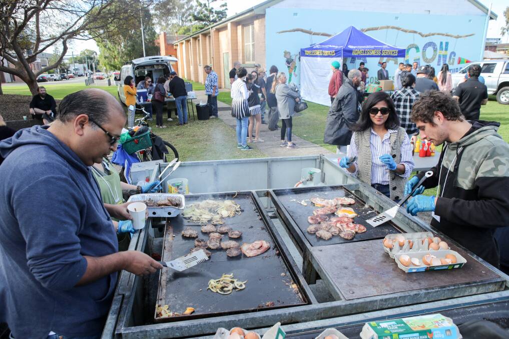 A free barbecue breakfast was also on offer, and warm jackets were also handed out. Picture: Adam McLean