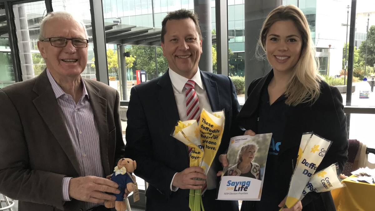 Illawarra Cancer Council advocate Brian Baird, Wollongong MP Paul Scully and Cancer Council community programs co-ordinator Emma Swords show their support for the Saving Life 2019 campaign. Picture: Supplied