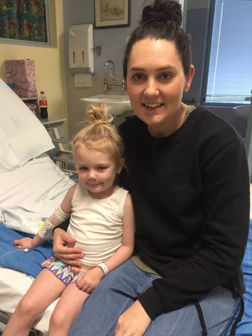 Dakoda, with her mum Ashlee Hughes, is on the mend after a short stay at Wollongong Hospital's children's ward.