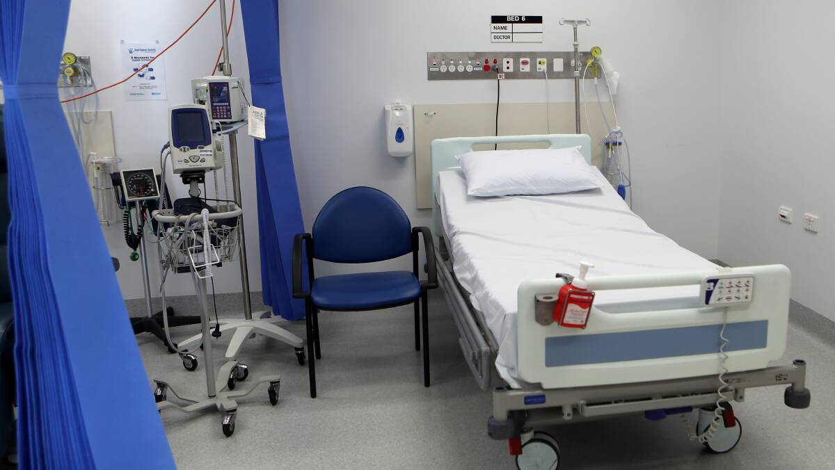 Wollongong MP Paul Scully says beds should not lie empty in the hospital's so-called 'ghost ward', while people face long waits for admission.