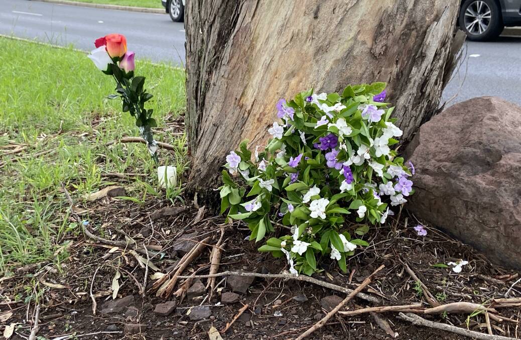 Flowers were laid at the site of the accident on Wattle Road. Picture: Ashleigh Tullis