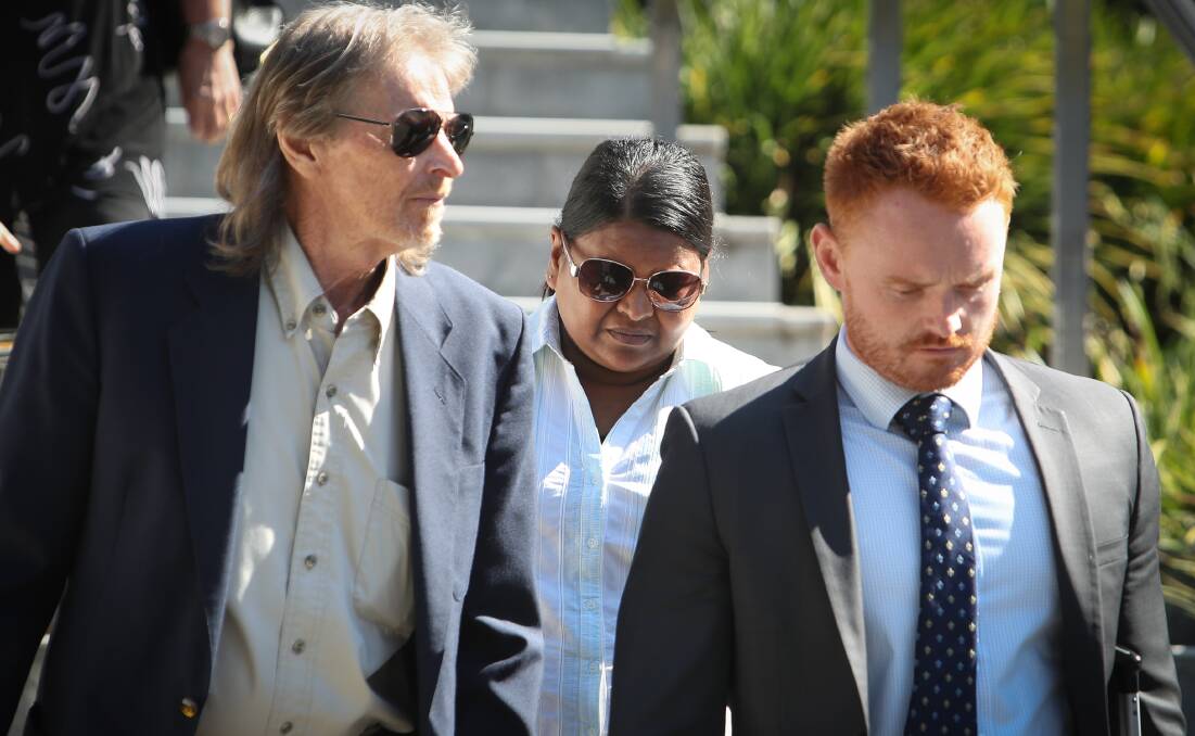 Assault charges: Shakuntala Mudaliar (centre) faces court accused of assaulting five elderly residents in her care at Warrigal Warilla late last year.