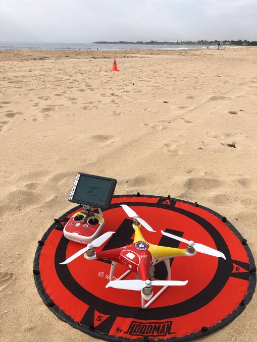 Sky high: One of two new drones delivered to Surf Life Saving Illawarra this season, allowing volunteers to patrol from the air and identify hazards like sharks and rips.