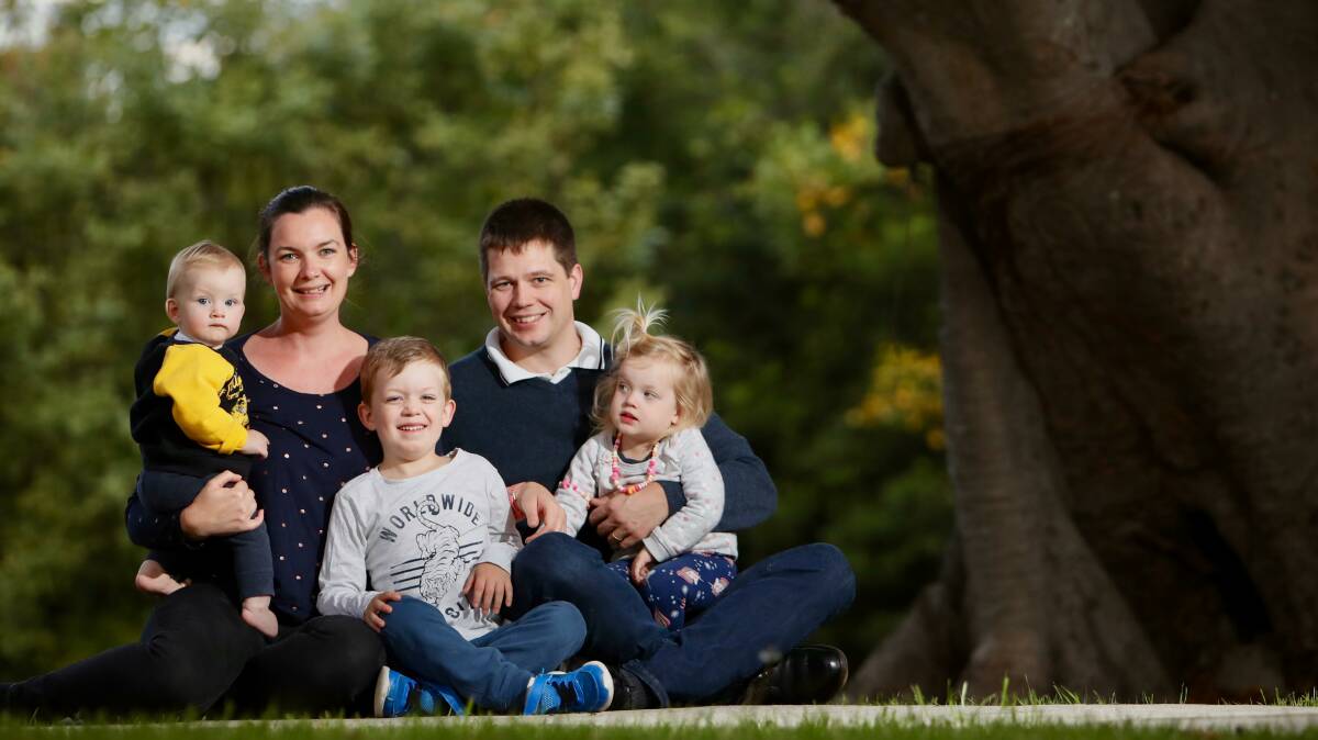 Running for research: Kate and Walter Fleitmann with nine-month-old Ben and his siblings Tom, 5, and Clara, 2. Picture: Adam McLean