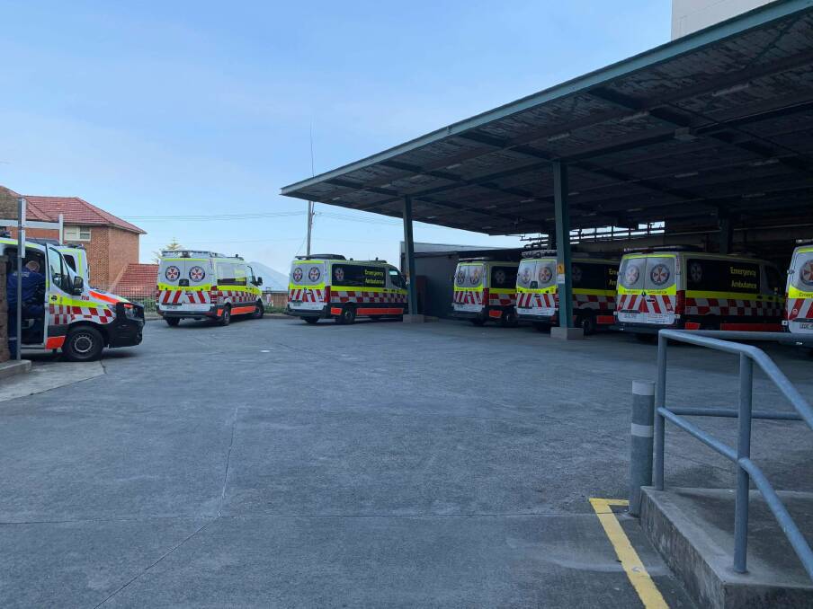 Waiting game: The Illawarra Shoalhaven sub-branch of the Health Services Union ambulance division shared this photo of ambulances in bed block at Wollongong Hospital on Monday afternoon. Picture: Supplied