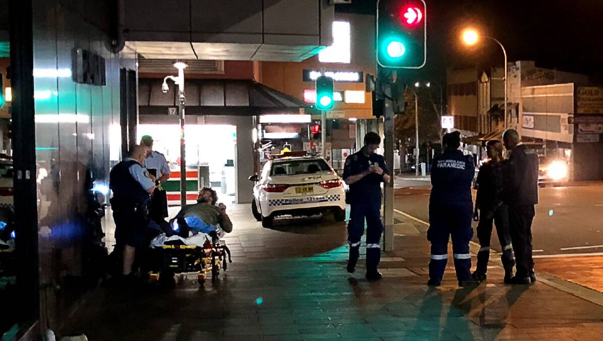 Emergency services at the scene of the incident on Tuesday night where a female paramedic was punched after coming to the aid of an injured man. Picture: Andrew Pearson