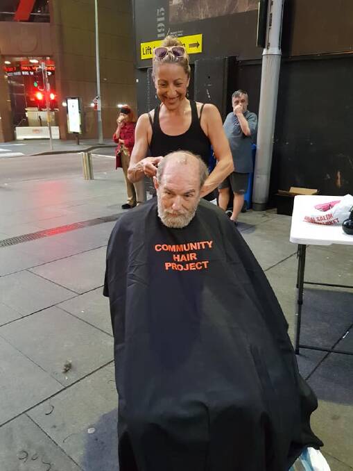Helping hand: Community Hair Project goes out to parks, to street corners - to wherever they might find those in need - to offer free haircuts. Pictures: Supplied