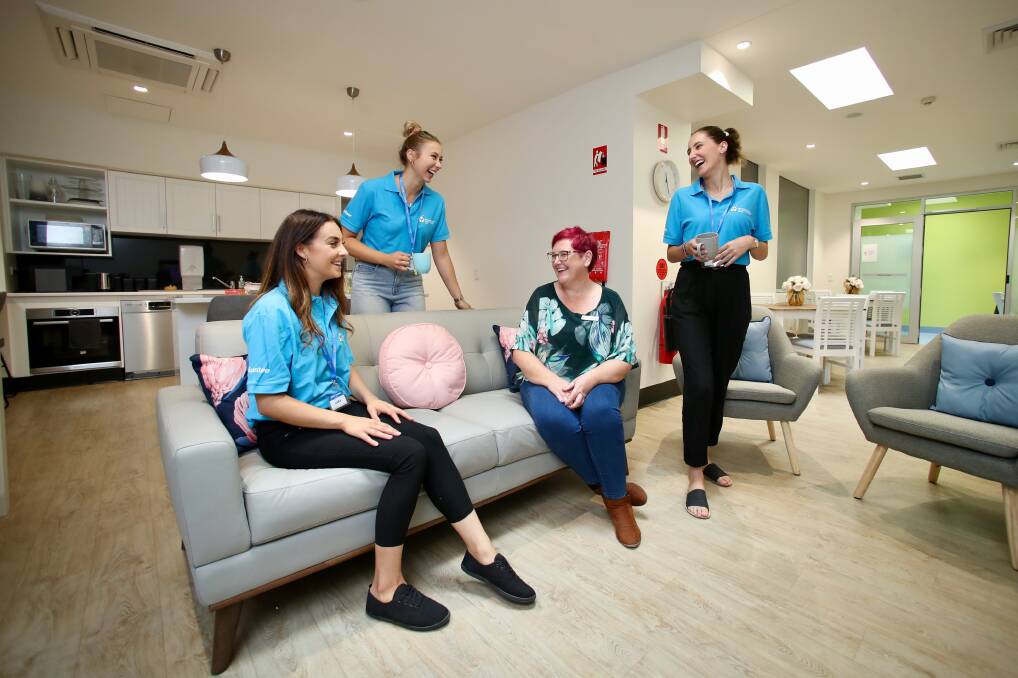 Home away from home: Ronald McDonald family room volunteers (back L-R) Elise Kulen and Layla Middleton with (seated) volunteer Lara Speering and room co-ordinator Dianne Mangley. The Wollongong room opened on December 6. Picture: Adam McLean