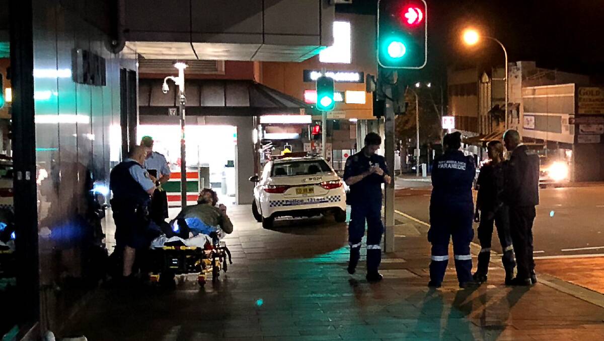 April assault: A female paramedic was punched in the face while helping an injured man in Wollongong's CBD earlier this year, sparking calls for a trial of body-worn cameras.